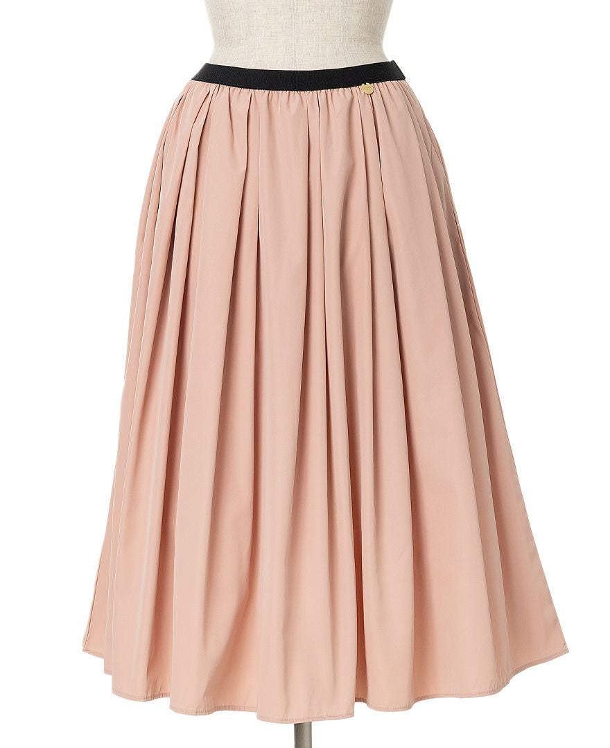 トレコード(TRECODE)黒ゴムフレアスカートピンクカラー