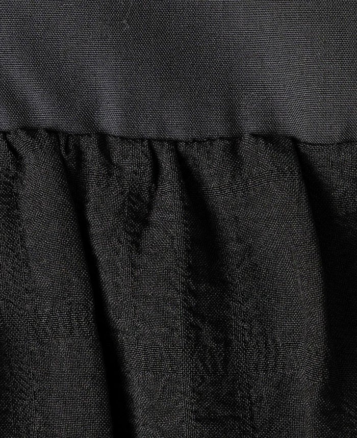 ティアードトップス/ripplesの生地アップ画像。細かく凸凹したさざ波のような柄。