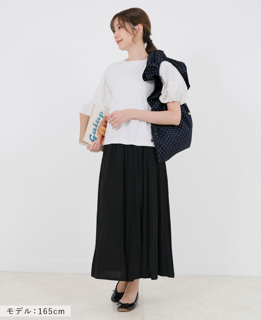 TRECODEのジャガード生地が上品さをプラスしてくれるドット柄のフリルバッグ。